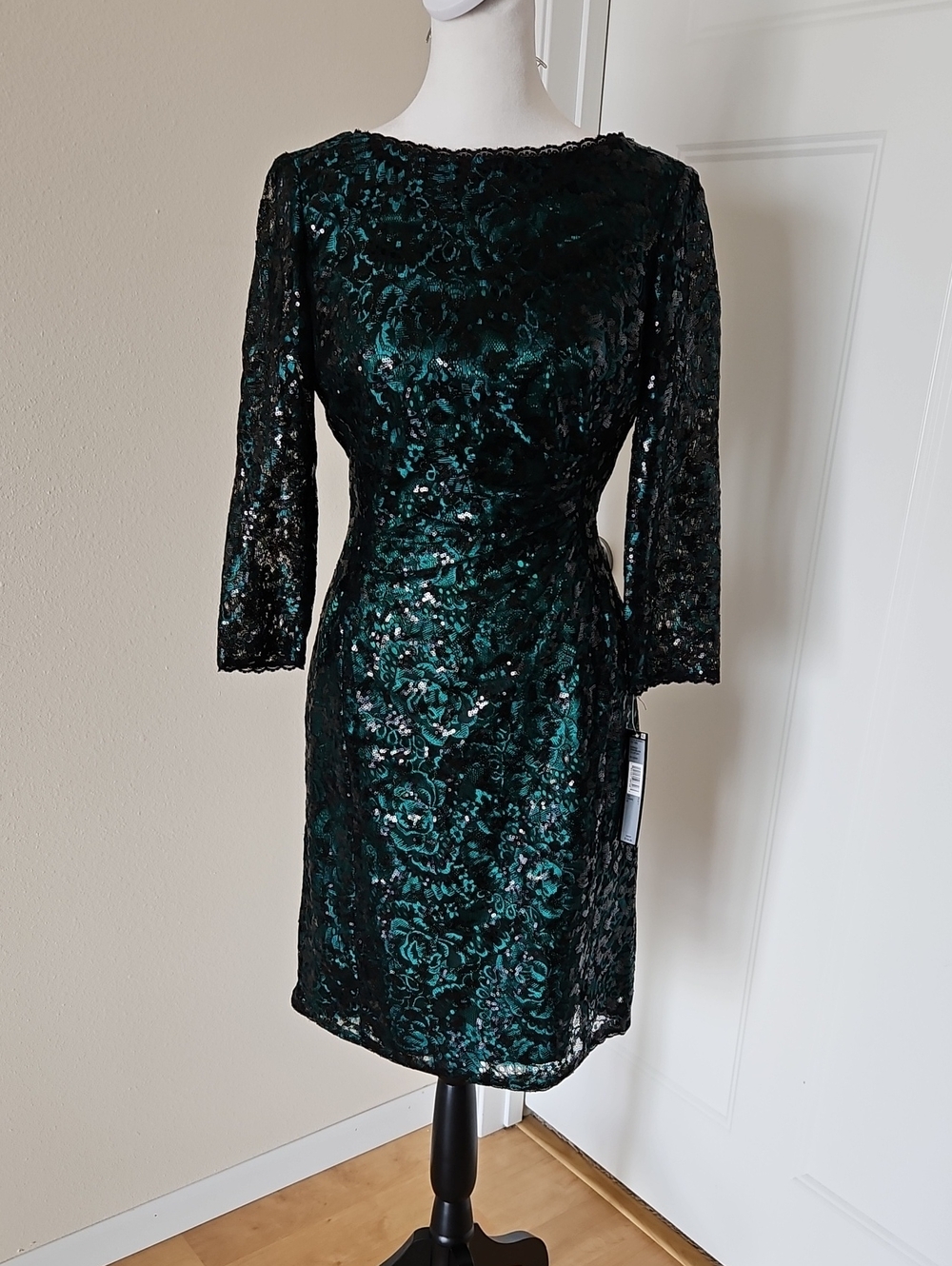 Size 2 emerald and black 3/4 sleeve bateau neck and ruched front cocktail dress
